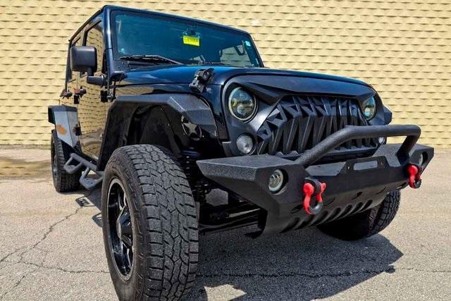 used 2014 Jeep Wrangler Unlimited car, priced at $20,457