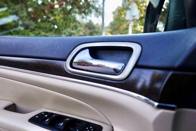 used 2014 Jeep Grand Cherokee car, priced at $11,354