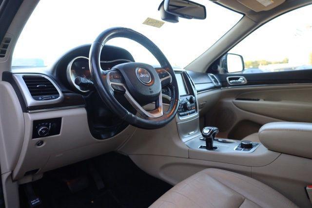 used 2014 Jeep Grand Cherokee car, priced at $11,354