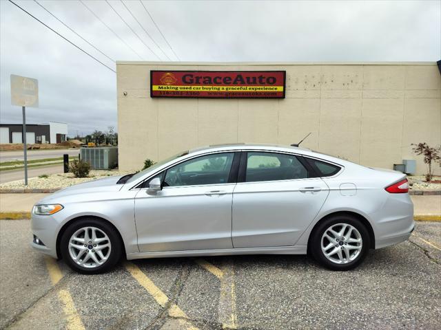 used 2015 Ford Fusion car, priced at $11,999