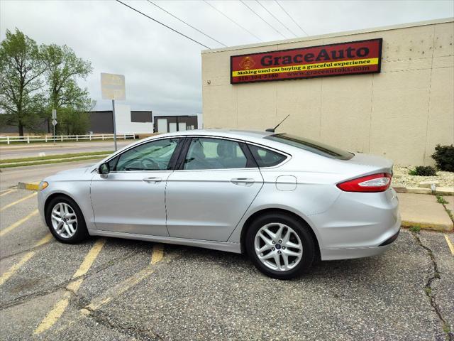 used 2015 Ford Fusion car, priced at $11,999