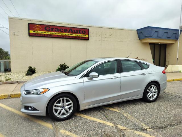 used 2015 Ford Fusion car, priced at $11,999