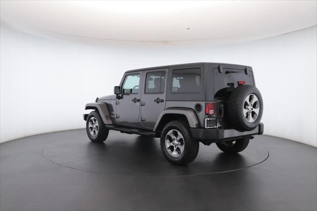 used 2016 Jeep Wrangler Unlimited car, priced at $23,500