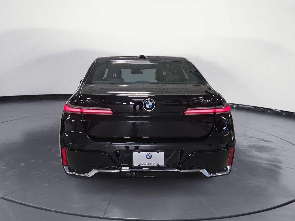 used 2024 BMW 740 car, priced at $70,497