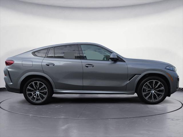 used 2025 BMW X6 car, priced at $73,998