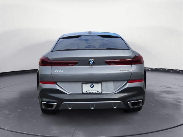 used 2025 BMW X6 car, priced at $73,998