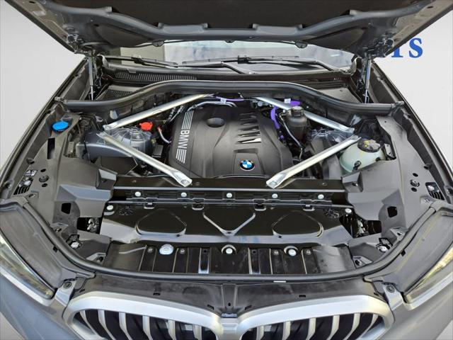 used 2025 BMW X6 car, priced at $73,998