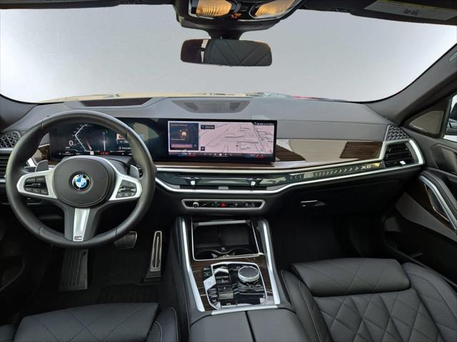 used 2025 BMW X6 car, priced at $73,998