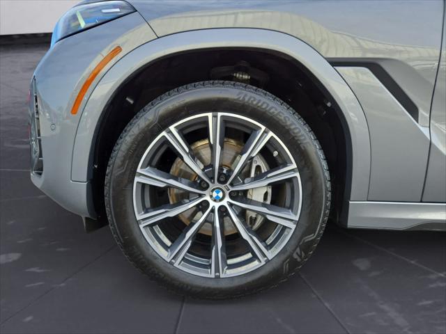 used 2025 BMW X6 car, priced at $73,998