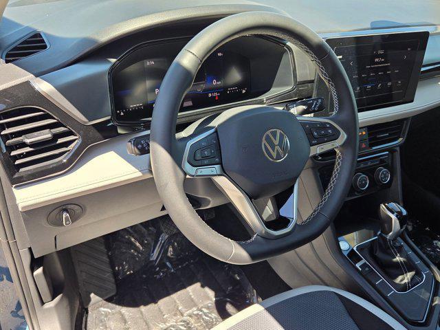 new 2025 Volkswagen Taos car, priced at $26,001