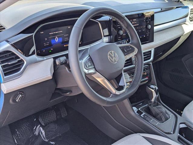 new 2025 Volkswagen Taos car, priced at $28,911