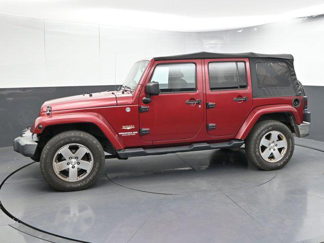 used 2012 Jeep Wrangler Unlimited car, priced at $13,991