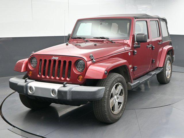 used 2012 Jeep Wrangler Unlimited car, priced at $13,991