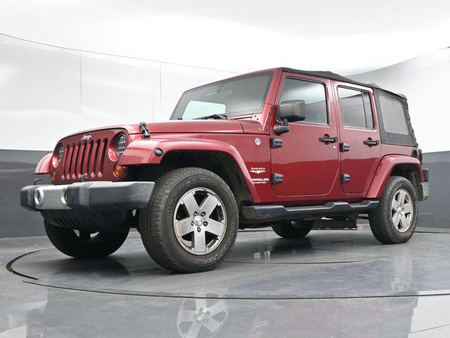 used 2012 Jeep Wrangler Unlimited car, priced at $13,991