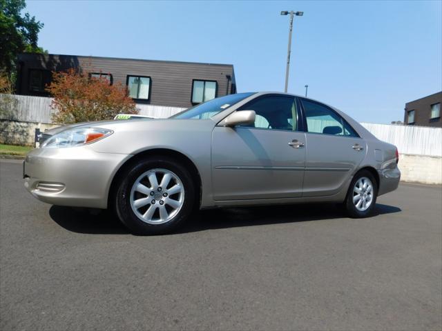 used 2002 Toyota Camry car, priced at $2,833