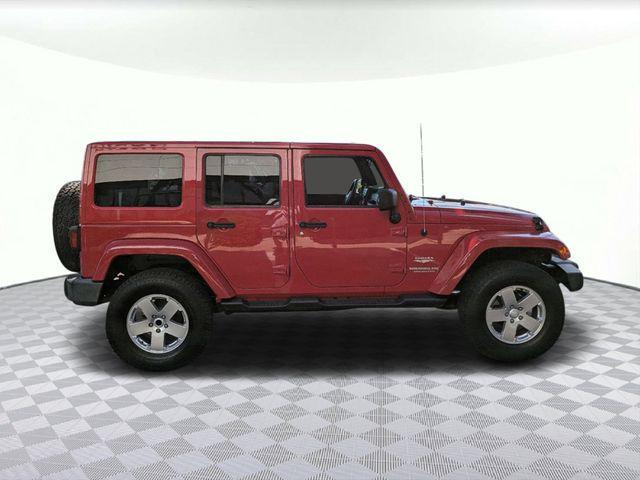 used 2011 Jeep Wrangler Unlimited car, priced at $15,980