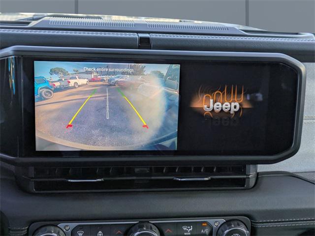 used 2024 Jeep Wrangler 4xe car, priced at $27,443