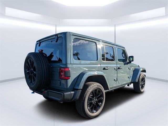 used 2024 Jeep Wrangler 4xe car, priced at $27,443
