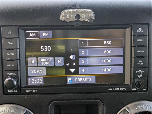 used 2018 Jeep Wrangler JK Unlimited car, priced at $25,879