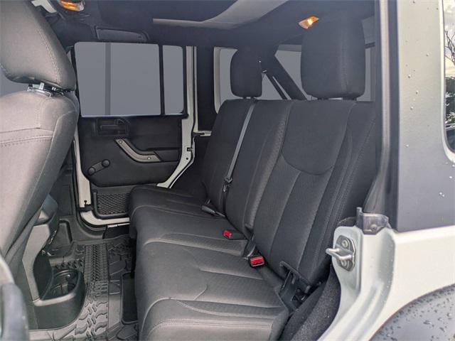 used 2018 Jeep Wrangler JK Unlimited car, priced at $25,879