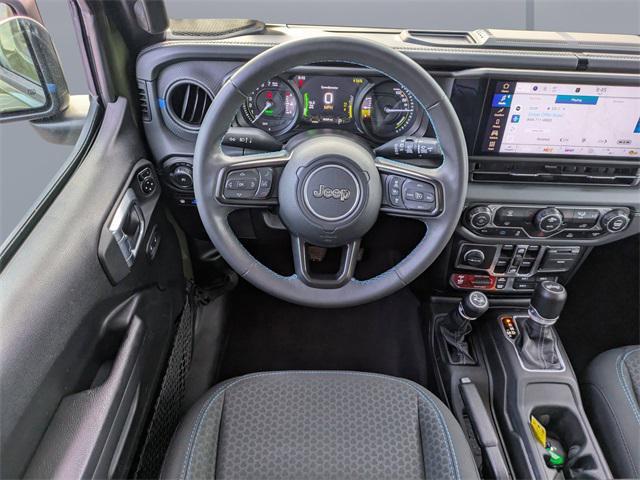 used 2024 Jeep Wrangler 4xe car, priced at $31,948