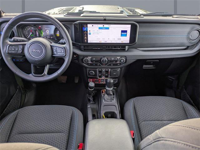used 2024 Jeep Wrangler 4xe car, priced at $31,948