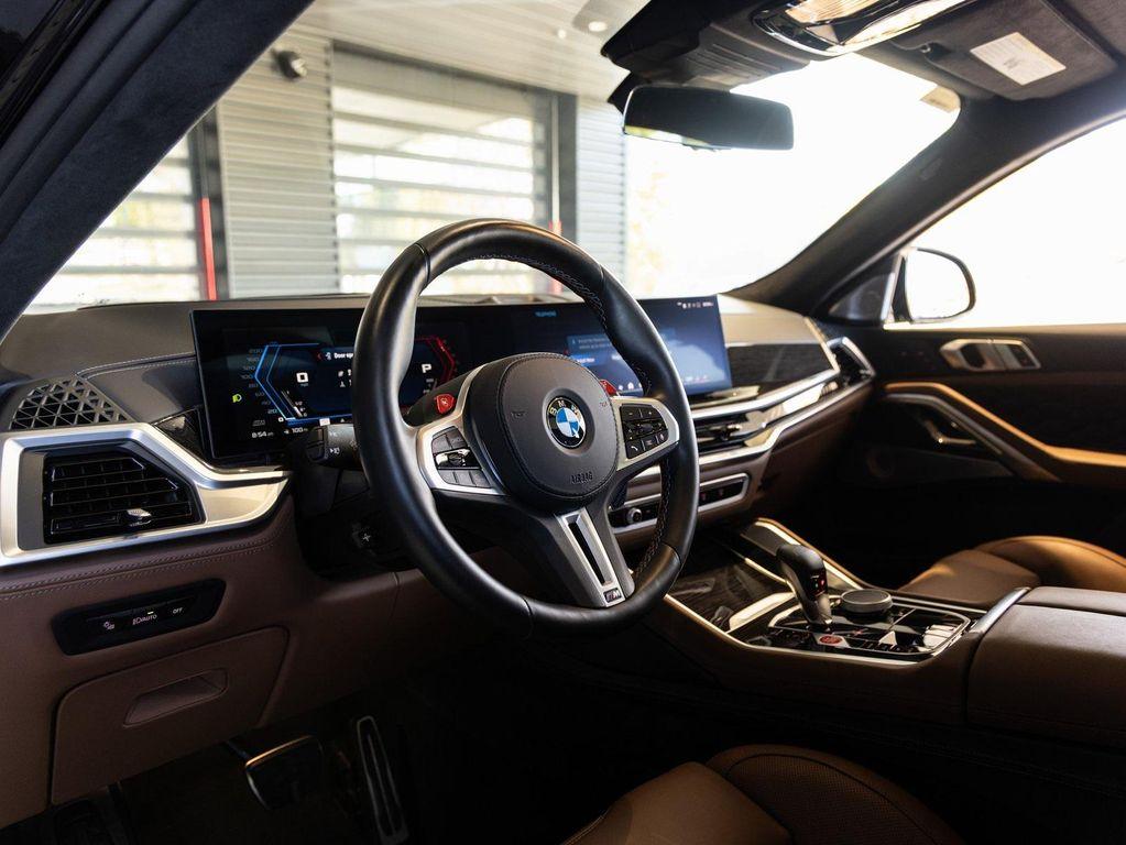 used 2025 BMW X6 M car, priced at $127,988