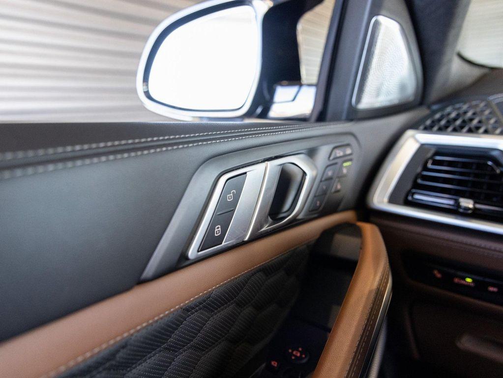 used 2025 BMW X6 M car, priced at $127,988