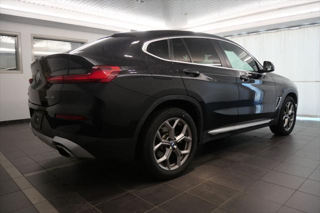 used 2023 BMW X4 car, priced at $37,944