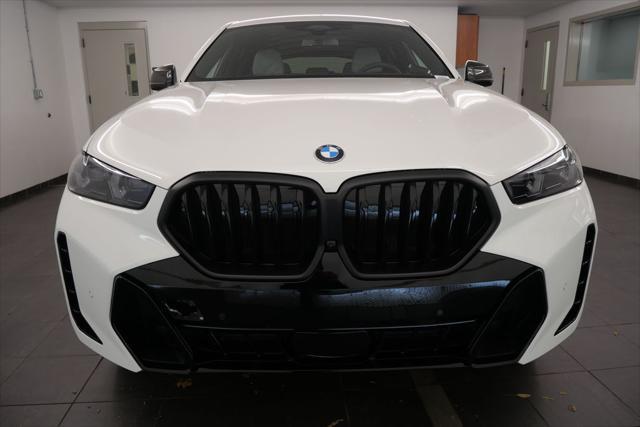 new 2025 BMW X6 car, priced at $85,030