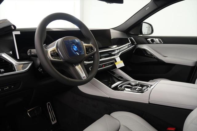 new 2025 BMW X6 car, priced at $85,030