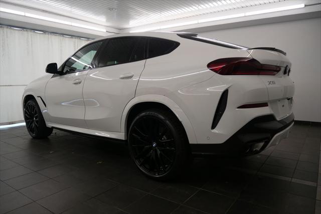 new 2025 BMW X6 car, priced at $85,030