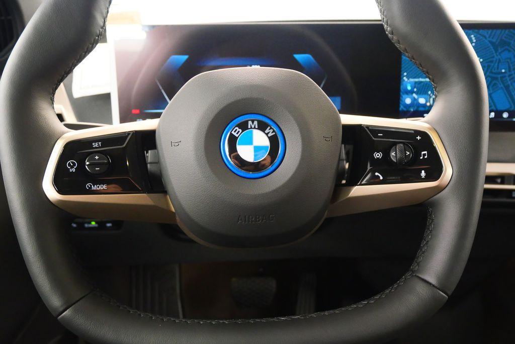 new 2024 BMW iX car, priced at $95,095