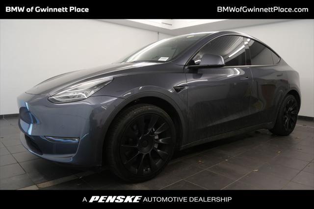 used 2022 Tesla Model Y car, priced at $27,341