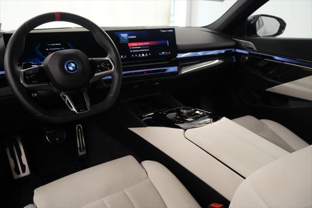 used 2024 BMW i5 car, priced at $73,944