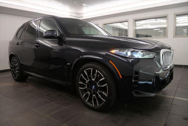 used 2025 BMW X5 PHEV car, priced at $79,544