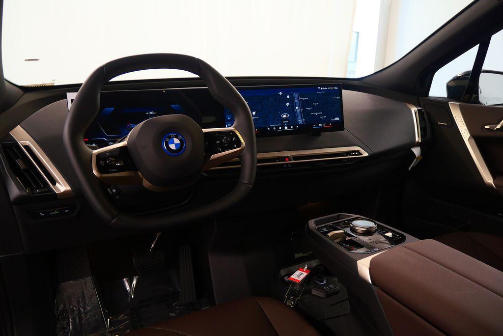 new 2024 BMW iX car, priced at $95,095