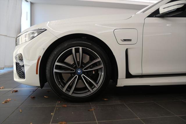 used 2022 BMW 745e car, priced at $54,544