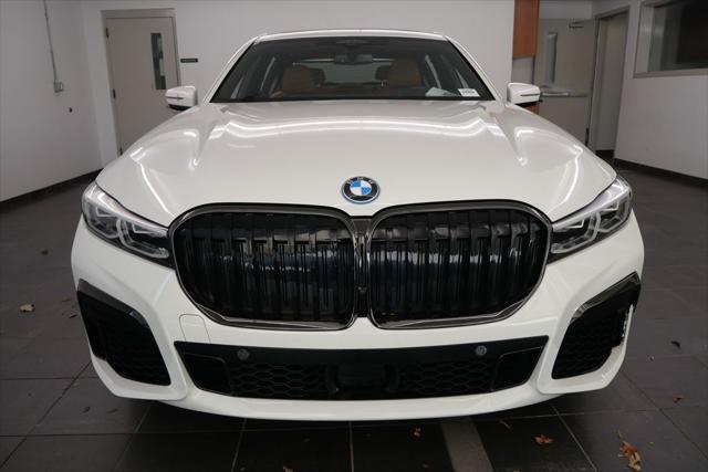 used 2022 BMW 745e car, priced at $54,544