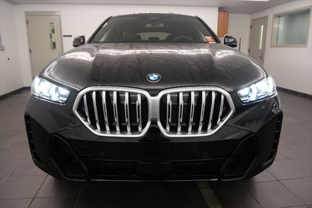 new 2025 BMW X6 car, priced at $77,875