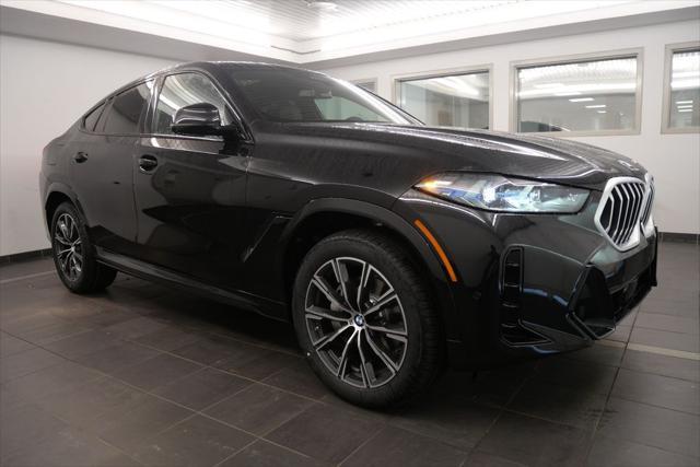 new 2025 BMW X6 car, priced at $77,875