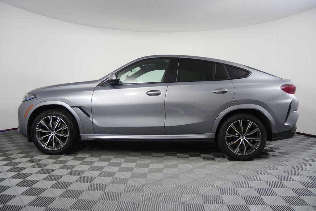 used 2025 BMW X6 car, priced at $58,944