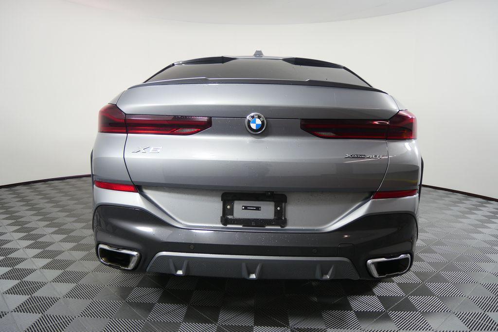 used 2025 BMW X6 car, priced at $58,944