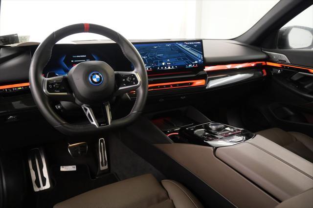 used 2024 BMW i5 car, priced at $70,941