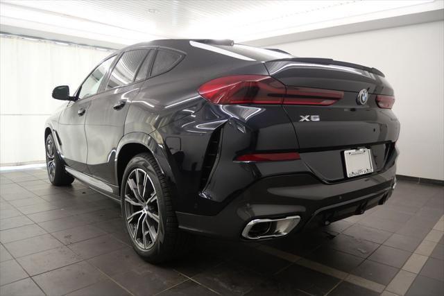 new 2025 BMW X6 car, priced at $77,875