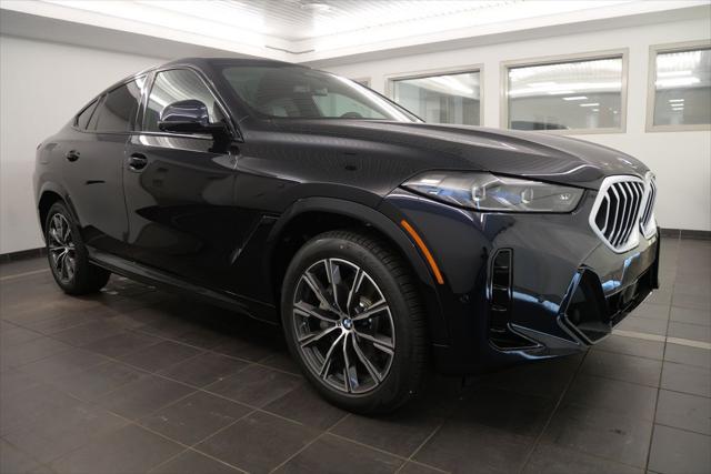 new 2025 BMW X6 car, priced at $77,875