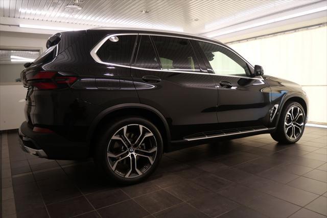 used 2025 BMW X5 car, priced at $66,944