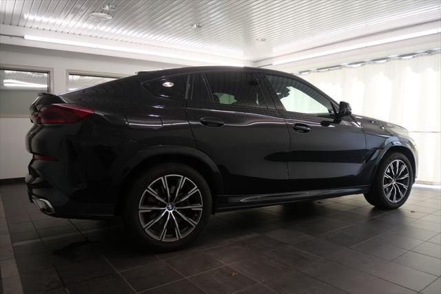 used 2024 BMW X6 car, priced at $62,944