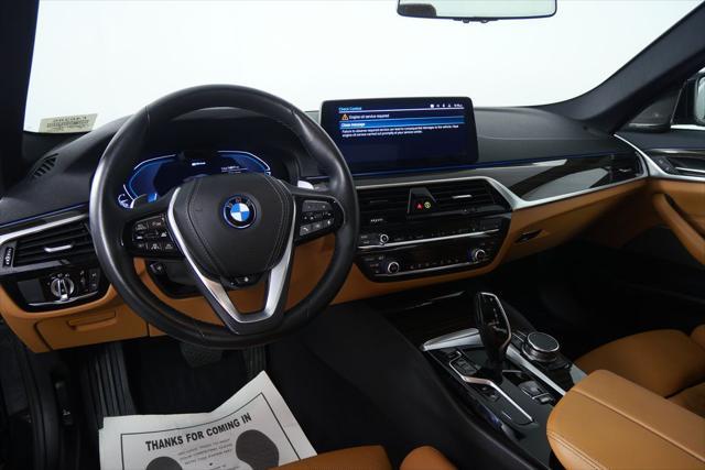 used 2023 BMW 530e car, priced at $38,941