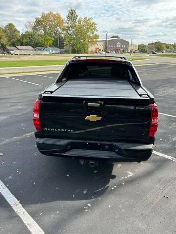 used 2013 Chevrolet Avalanche car, priced at $15,500